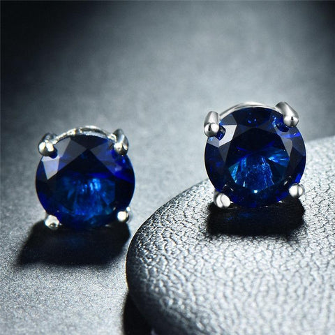 Seven Pairs of 8mm Round Earrings with Crystals from ®