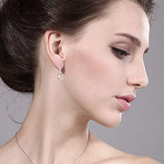 2.60 CTTW Morganite Oval Cut Earrings in 14K White Gold Plating