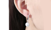 White  Elements Thin Dangling Freshwater Pearl Clip On Earrings in 14K White Gold Plating