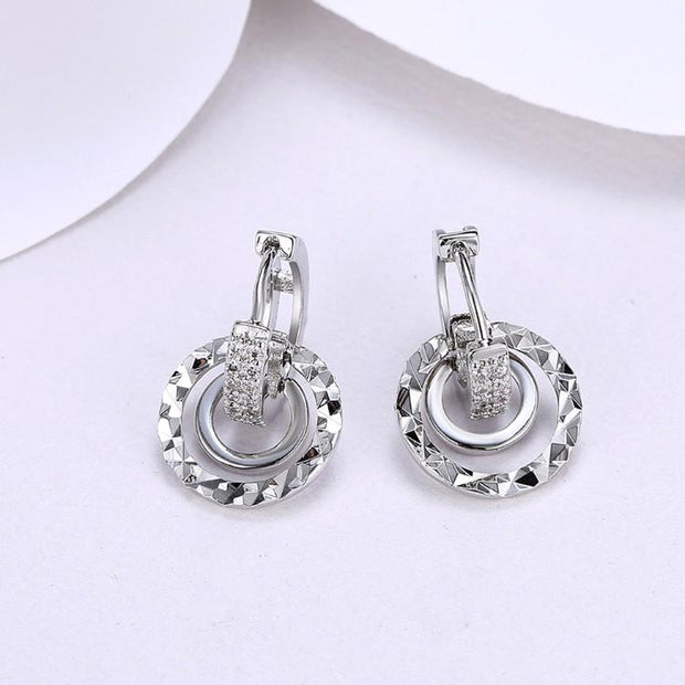 Swarovski Crystal Hammered Design Circular Earrings Set in 18K White Gold - ALILY  www..com fashion jewelry for women