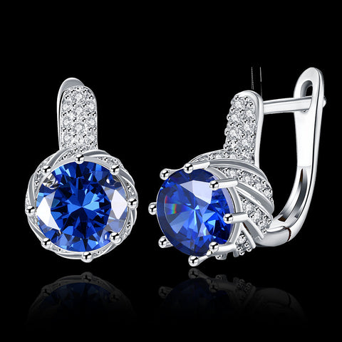 Vienna 1.00 Ct Sapphire Round Cut Huggie Earring in 18K White Gold Plated
