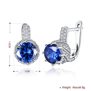 Vienna 1.00 Ct Sapphire Round Cut Huggie Earring in 18K White Gold Plated