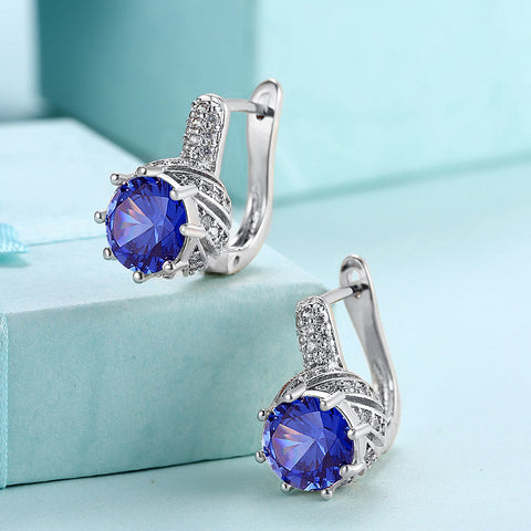 Vienna 1.00 Ct Sapphire Round Cut Huggie Earring in 18K White Gold Plated