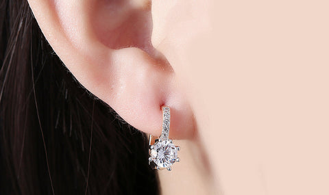 White Topaz 0.70 CT Round Huggie Earring in 18K White Gold Plated