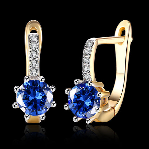 Blue Topaz 0.70 CT Round Huggie Earring in 18K White Gold Plated