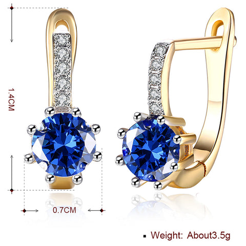 Blue Topaz 0.70 CT Round Huggie Earring in 18K White Gold Plated