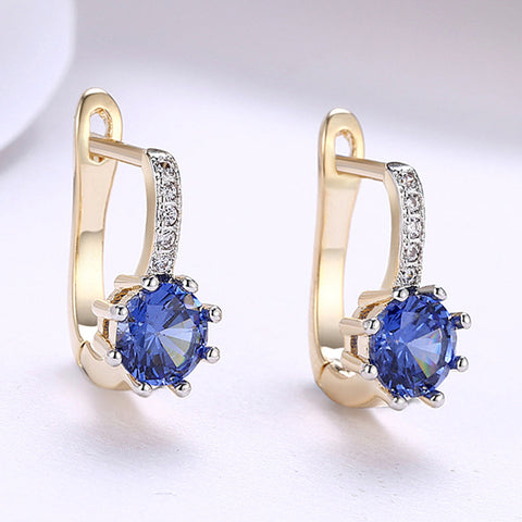 Blue Topaz 0.70 CT Round Huggie Earring in 18K White Gold Plated
